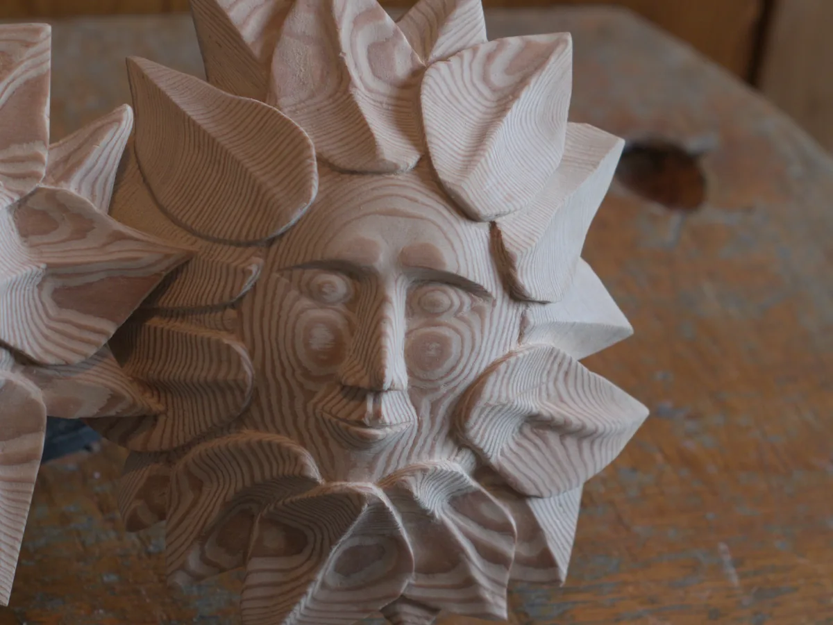 Spirit family carving - right face