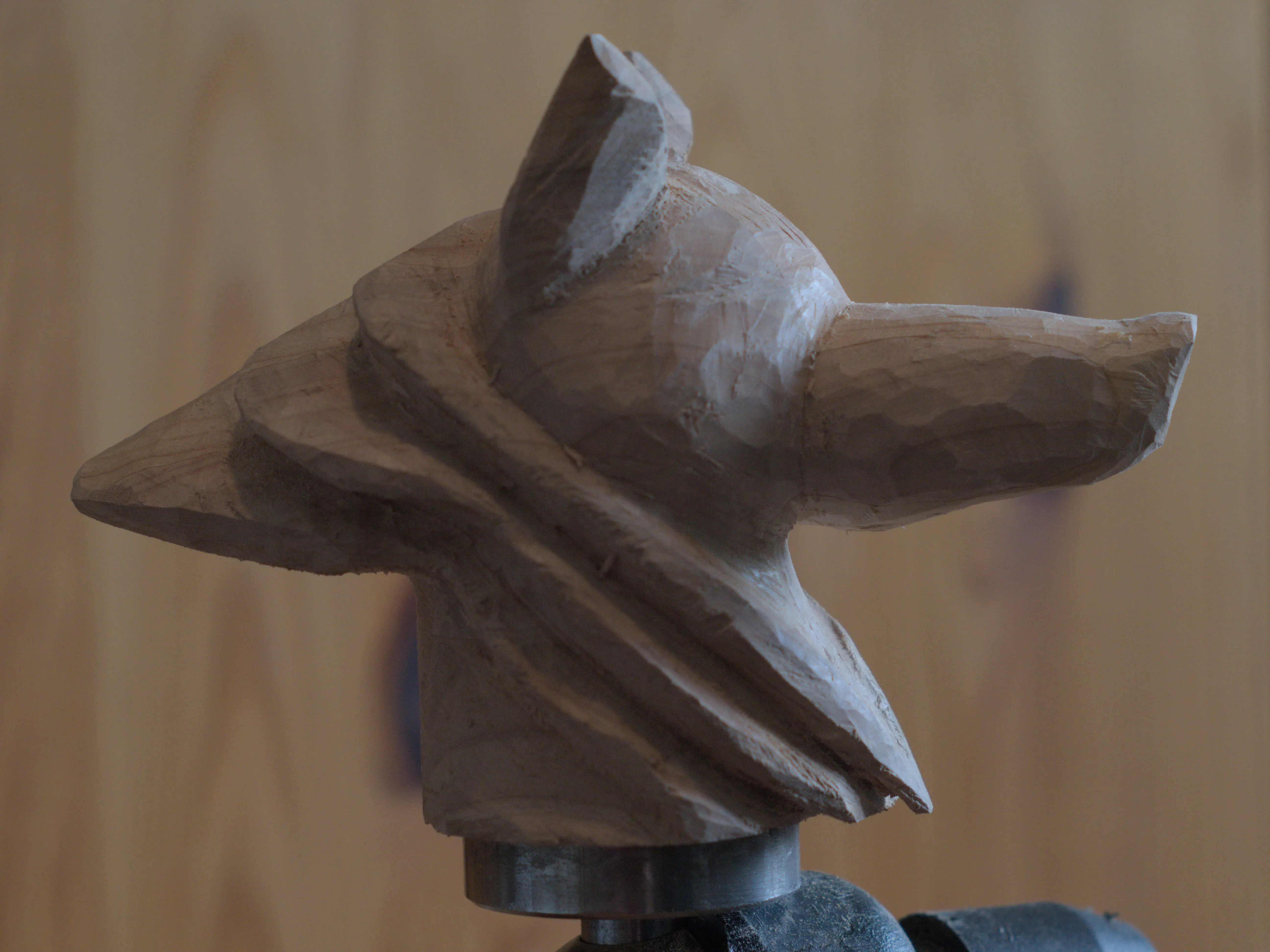 Wolf head portrait carving in progress